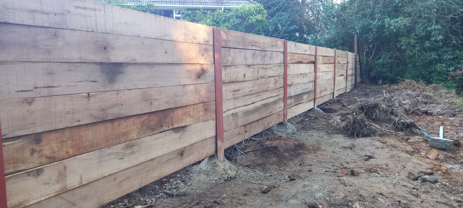 Sleeper retaining wall construction under way in Haslemere